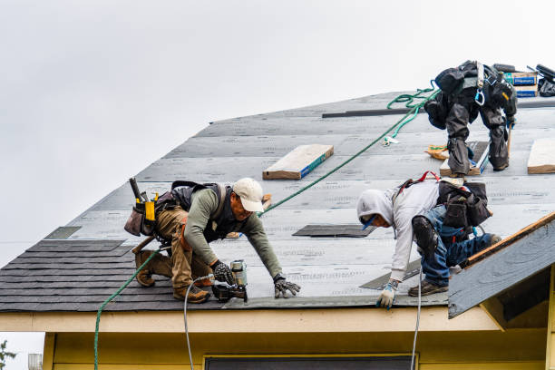 Professional Storm Damage Roof Repair technician working in New Milford, NY